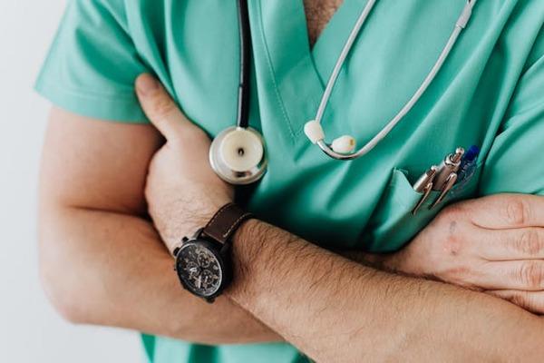 doctor with stethoscope in hospital