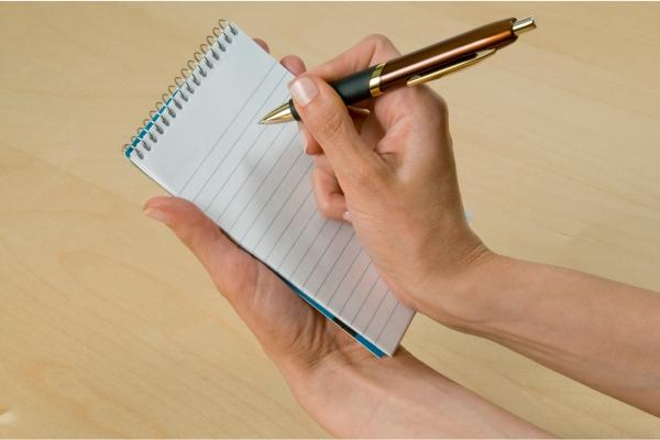 A person keeping track of bladder health improvements.